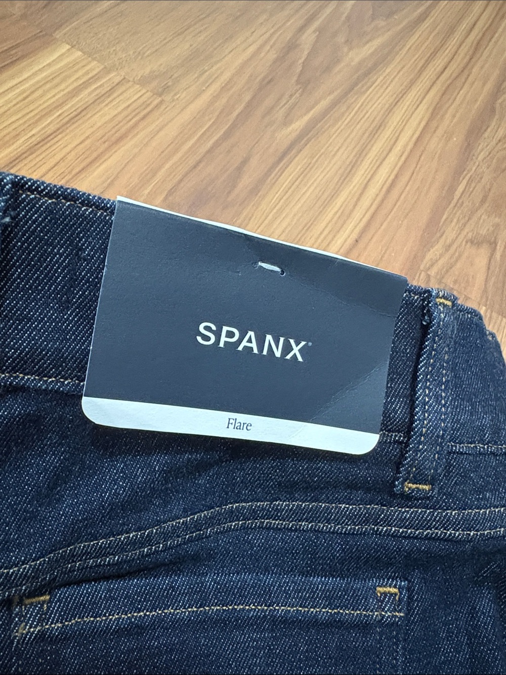 SPANX Denim Jeans in Dark Blue with Gold Stitching